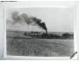 Fotografie černobílá parní loko s osobním vlakem *4098